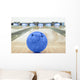 Balls on bowling alley against ten pins Wall Mural