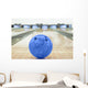 Balls on bowling alley against ten pins Wall Mural