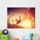 Hiker free falling from the mountain. Man in fatal situation Wall Mural