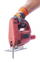 Hand In A Glove Holds A Working Electric Jig Saw Wall Decal