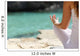 Detail of a woman hand doing yoga exercises on the beach Wall Mural