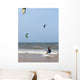 Unidentified people during demonstration of kitesurfing Wall Mural