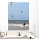 Unidentified people during demonstration of kitesurfing Wall Mural