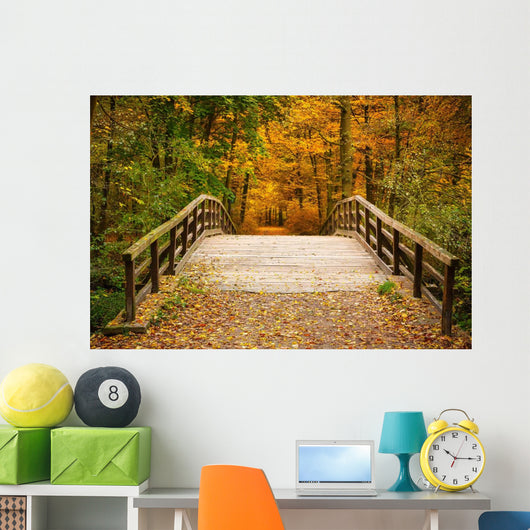 Bridge in autumn forest Wall Mural