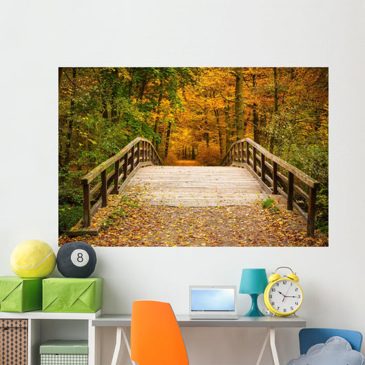 Bridge in autumn forest Wall Mural