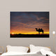 Camel at sunset Wall Mural