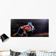 American football player in action at game time Wall Mural