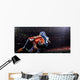 American football player in action at game time Wall Mural