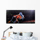 American football player in action at game time Wall Mural
