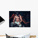 muscle shaped man tired sitting relaxed with weights and energy Wall Mural