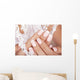 Beautiful woman's nails with french manicure. Wall Mural