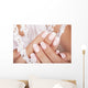 Beautiful woman's nails with french manicure. Wall Mural