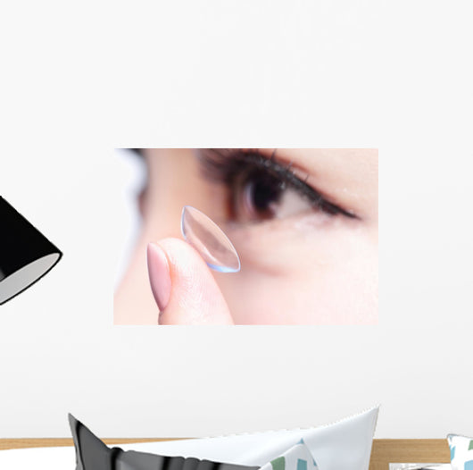 human eye and contact lens Wall Mural
