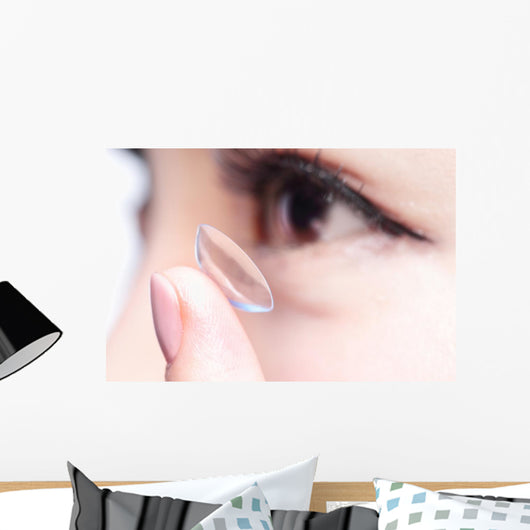 human eye and contact lens Wall Mural