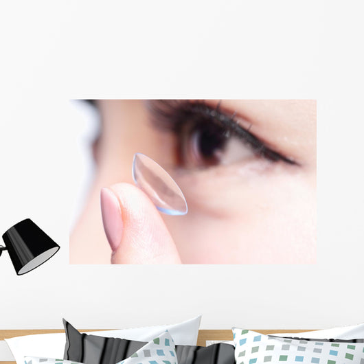human eye and contact lens Wall Mural