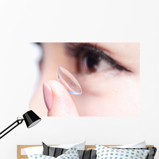 human eye and contact lens Wall Mural