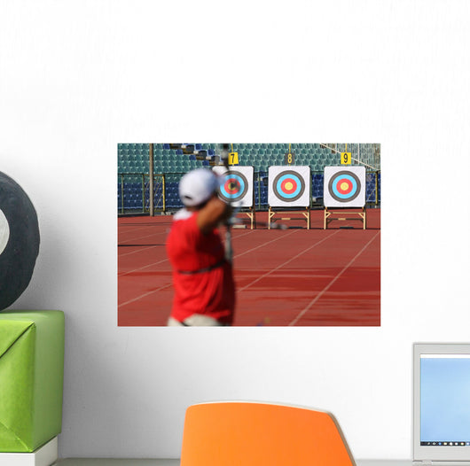 Bow and arrow in the hands of an archer Wall Mural