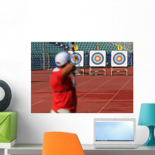 Bow and arrow in the hands of an archer Wall Mural