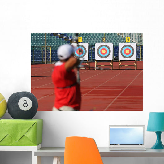Bow and arrow in the hands of an archer Wall Mural