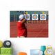 Bow and arrow in the hands of an archer Wall Mural