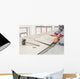 Handyman laying tile, trowel with mortar Wall Mural