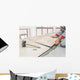 Handyman laying tile, trowel with mortar Wall Mural