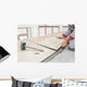 Handyman laying tile, trowel with mortar Wall Mural