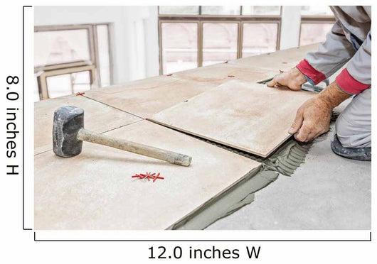Handyman laying tile, trowel with mortar Wall Mural