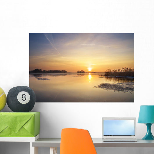 Sunrise on river Wall Mural