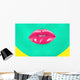 Close-up portrait of girl with green skin and pink lips Wall Mural
