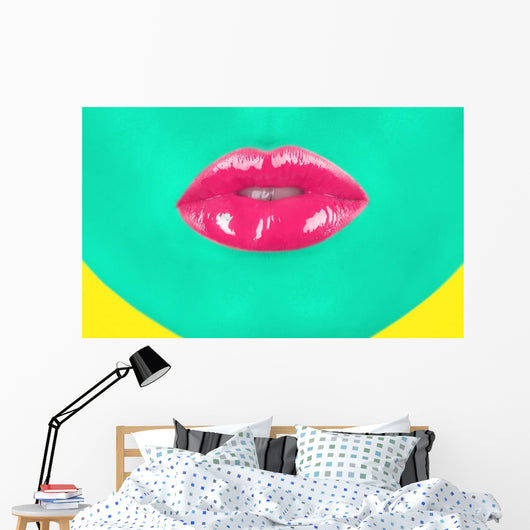 Close-up portrait of girl with green skin and pink lips Wall Mural