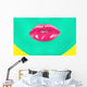 Close-up portrait of girl with green skin and pink lips Wall Mural