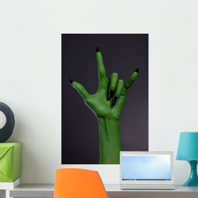 Green Hand with Black Wall Decal shown on a wall