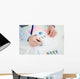 Businessman analysing a financial graph Wall Mural