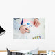Businessman analysing a financial graph Wall Mural