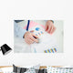 Businessman analysing a financial graph Wall Mural