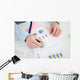 Businessman analysing a financial graph Wall Mural