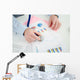 Businessman analysing a financial graph Wall Mural