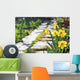 footpath garden grass track narcissus flowers background Wall Mural