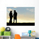 Silhouette of Happy Couple Holding Hands and Talking at Sunset Wall Mural