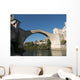 Plongeur, bras levÃ©s, sur le pont de Mostar en Bosnie. Wall Mural