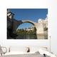 Plongeur, bras levÃ©s, sur le pont de Mostar en Bosnie. Wall Mural