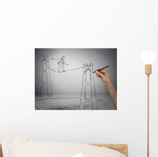 Businessman walking on a rope balancing on high altitude Wall Mural