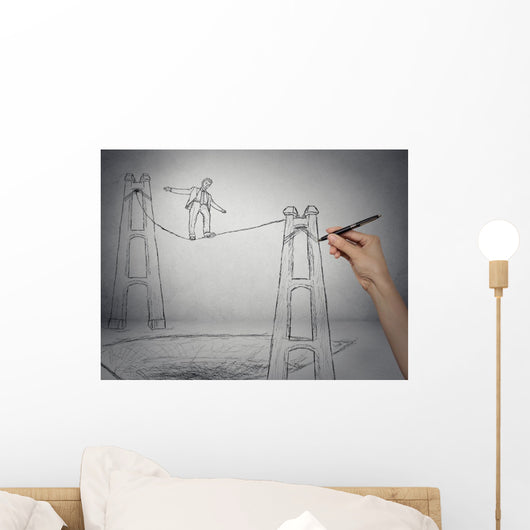 Businessman walking on a rope balancing on high altitude Wall Mural