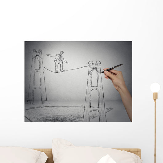 Businessman walking on a rope balancing on high altitude Wall Mural