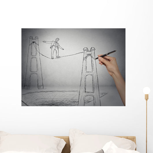 Businessman walking on a rope balancing on high altitude Wall Mural