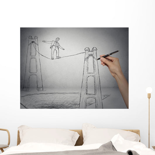 Businessman walking on a rope balancing on high altitude Wall Mural