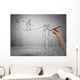 Businessman walking on a rope balancing on high altitude Wall Mural