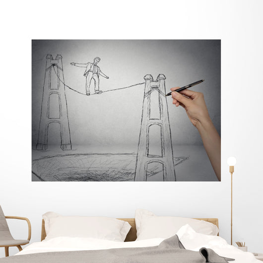 Businessman walking on a rope balancing on high altitude Wall Mural