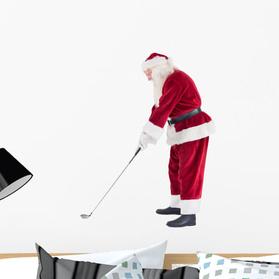 Santa Claus Is Playing Golf Wall Decal shown on a wall